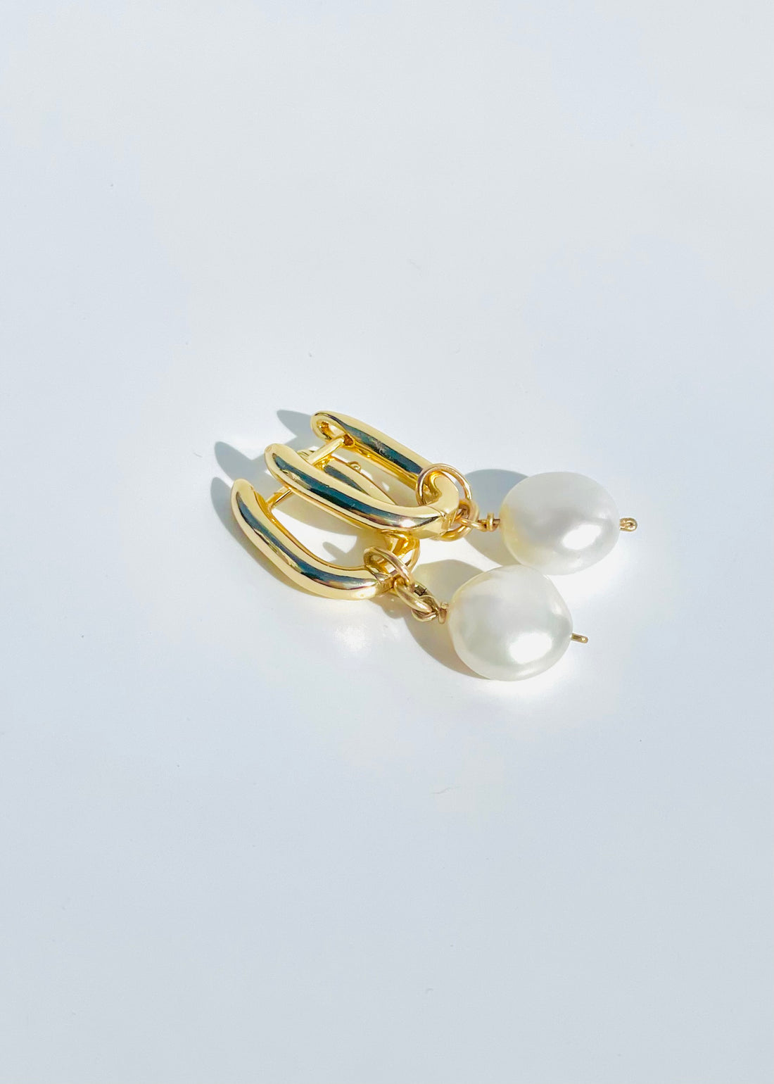 Bold Pearl Huggie Earrings
