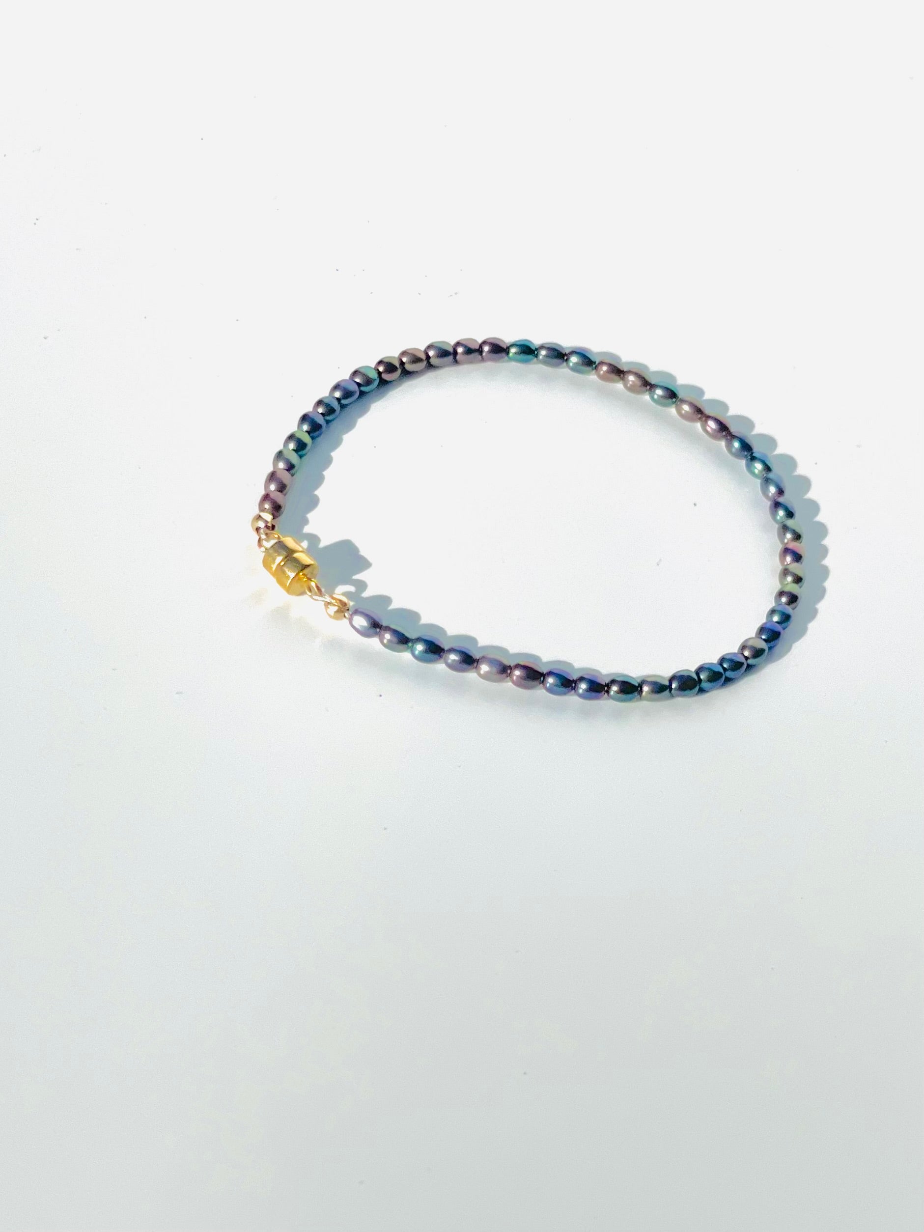 The Audrey Peacock Pearls Magnetic Bracelet