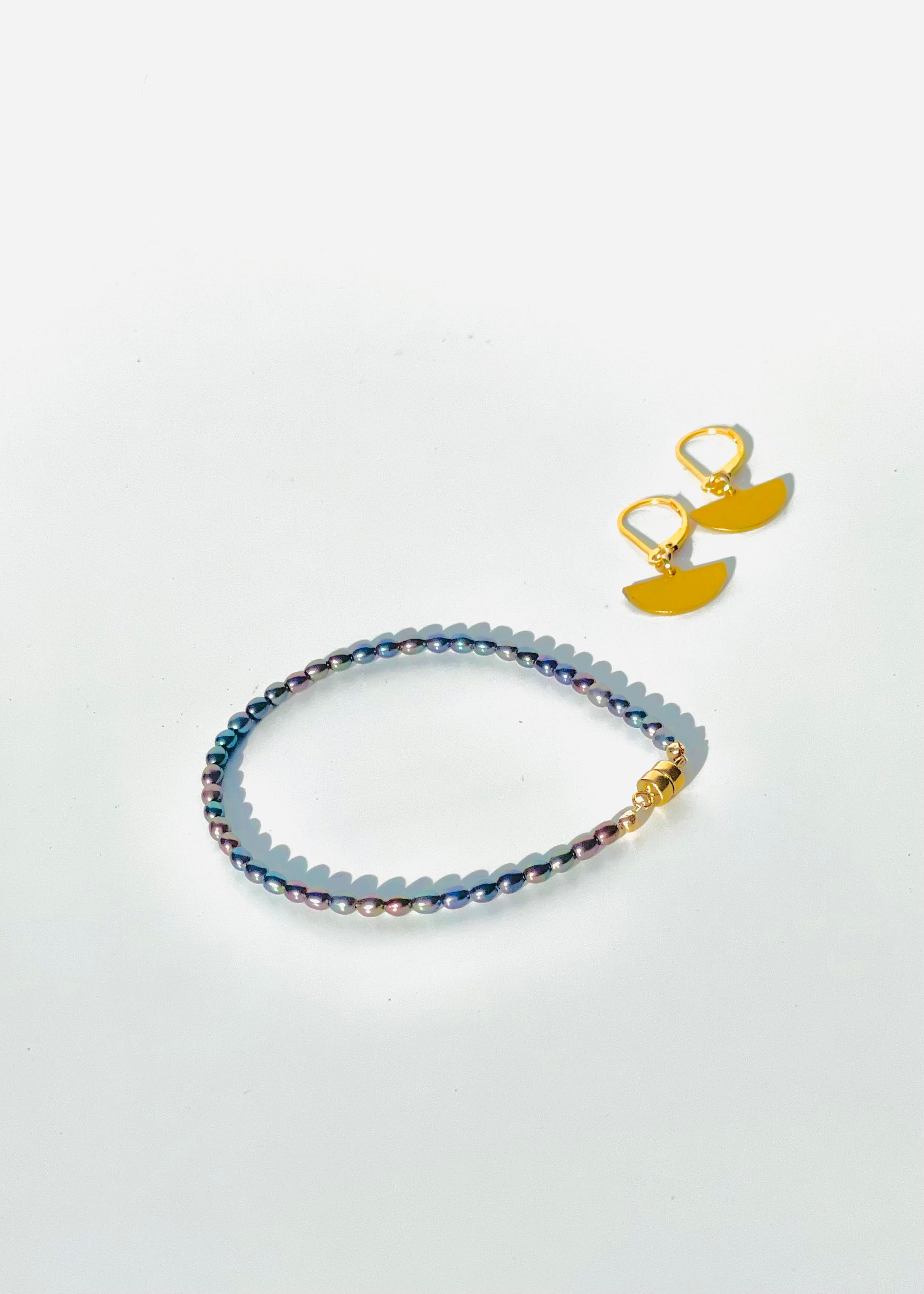 The Audrey Peacock Pearls Magnetic Bracelet