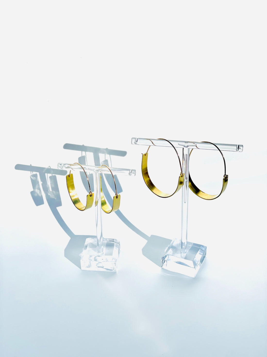 Hoop earrings with wider sheet metal hoop at base, gold-filled and brass