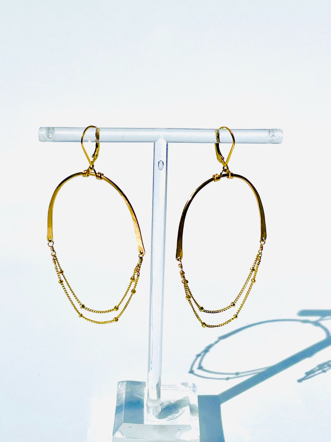 Half hoop, half chain, hoop earrings with lever back earwigs, Gold and Silver 2 1/2&quot; long, 1 1/2&quot; wide